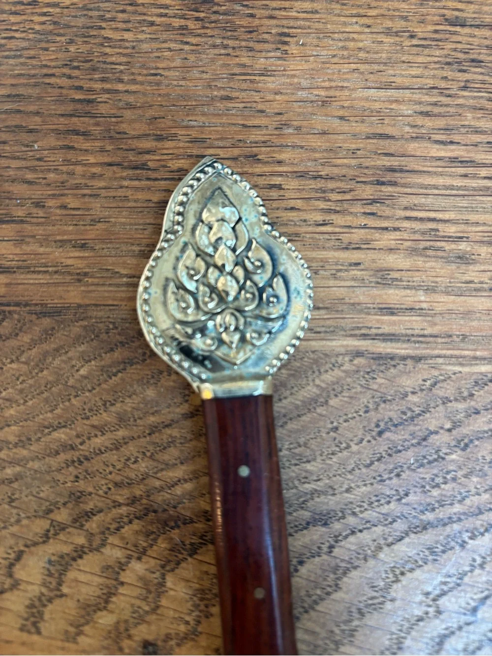 Vintage Brass and Wood Bottle Opener. Bottle Embossed Hindu Deity Design.